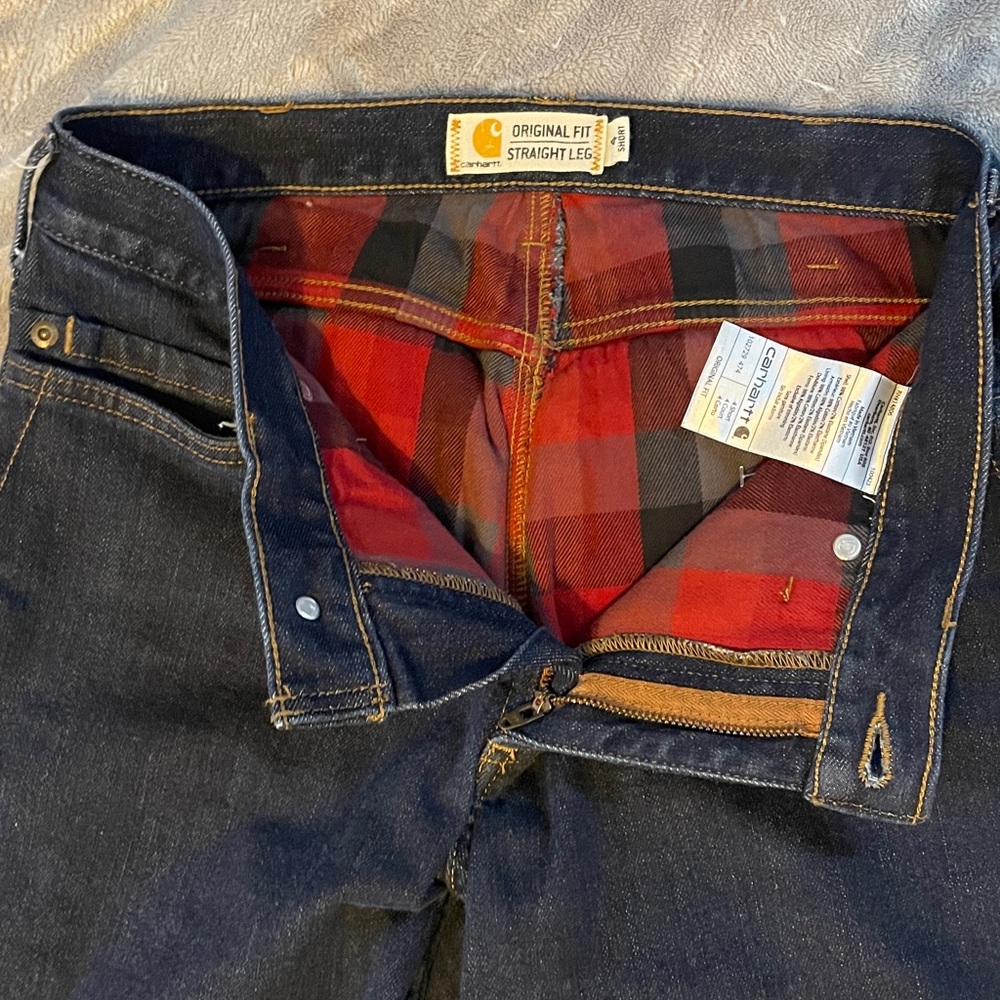 Carhartt straight leg, dark wash size 4 short insulated jeans.